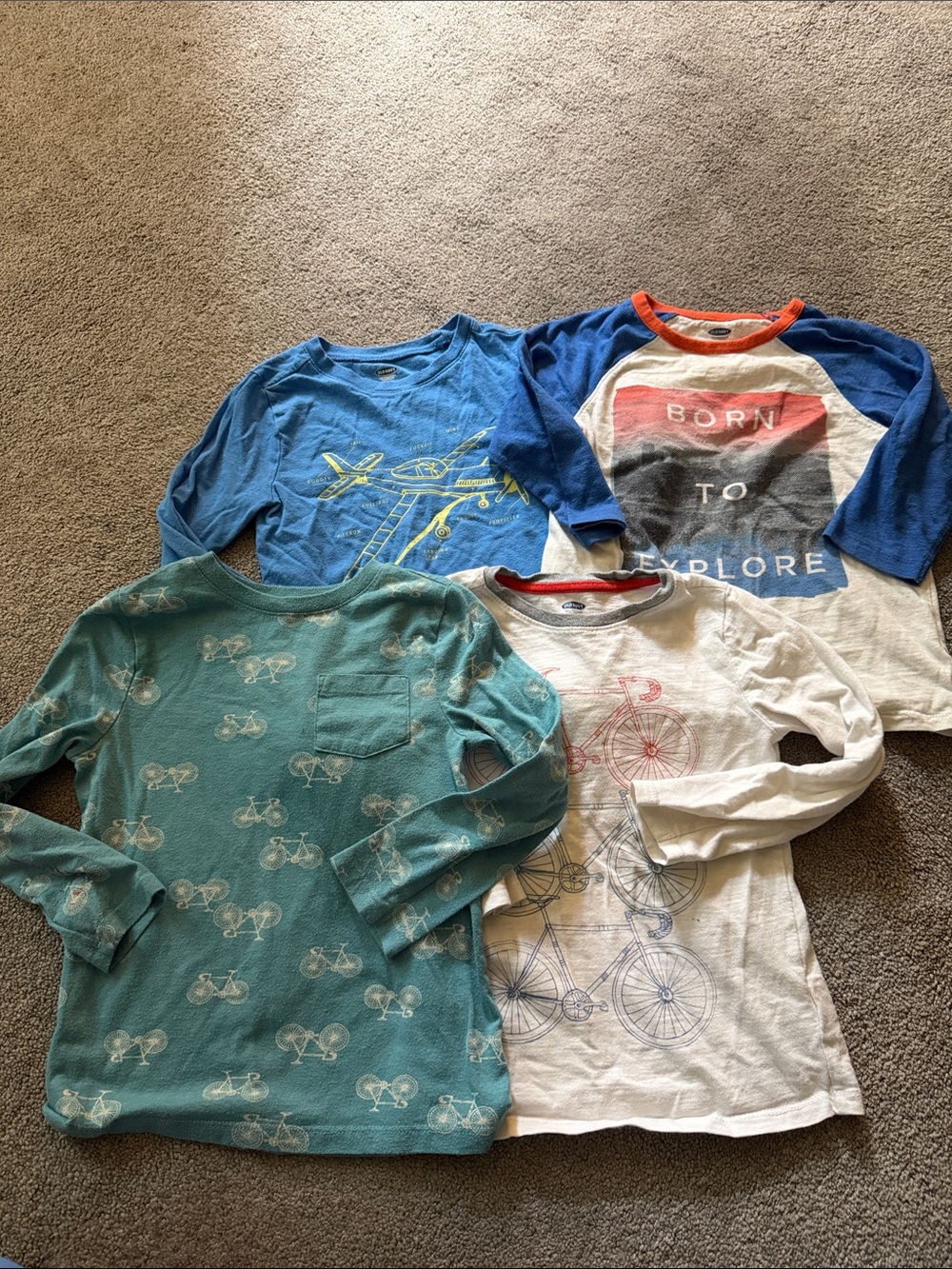 Set of four Old Navy Boys Long-Sleeve Graphic Tees in Blue, Teal, White